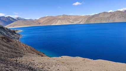 Pangong Tso Lake, at Ladakh India, Jammu Kashmir, blue clear water salty lake at world's highest point between Indo China border in India