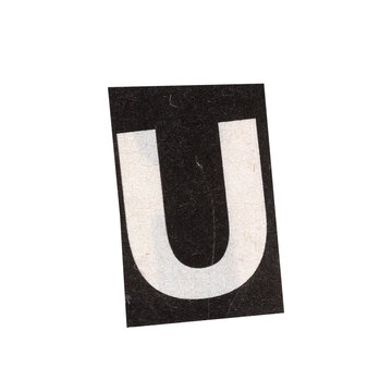 letter u magazine cut out font, ransom letter, isolated collage elements for text alphabet. hand made and cut, high quality scan. halftone pattern and texture detail. newspaper and scraps