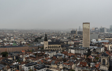 Fototapeta na wymiar Brussels Capital Region - Belgium - Aerial view over the Brussels Skyline with changing rainy and foggy weather