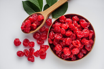 dried cherry berry on a white acrylic background