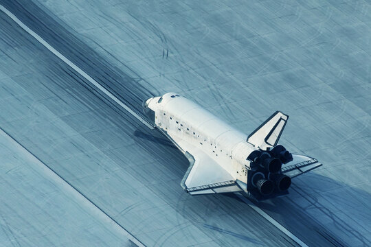 The space shuttle is landing. Elements of this image furnished by NASA