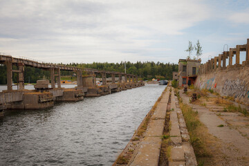 Fototapeta na wymiar Hara, Estonia - June 03 2021: Ruins of Hara Harbour buildings and submarine demagnetizing base.