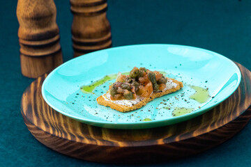 Salmon toast with cheese and capers