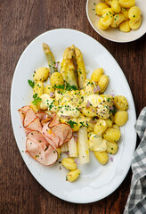 White asparagus with ham, Dutch sauce and gnocchi