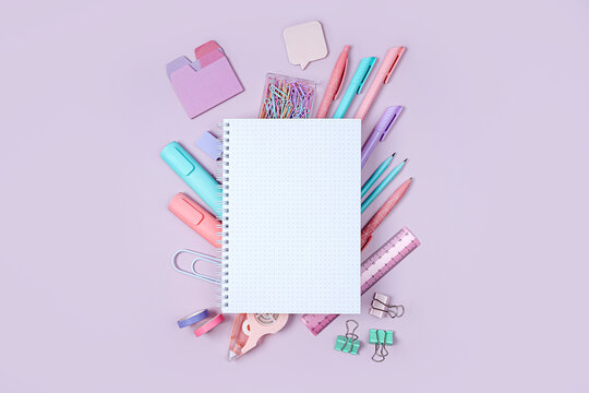 Mockup notebooks with School stationery supplies on pink background. Concept back to school. Blank notebook with copy space