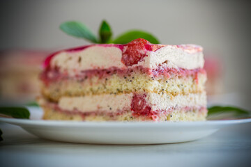 strawberry poppy cake with cream in a plate