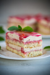 strawberry poppy cake with cream in a plate