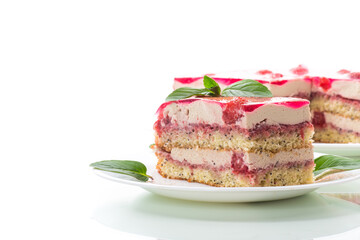 strawberry poppy cake with cream in a plate