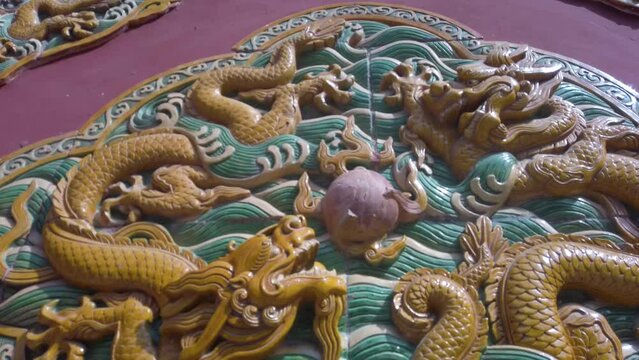 The carving Two Dragons Playing With Pearl , Beihai Park, Beijing, China