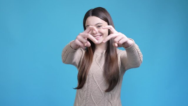 Cute sweet teen lady make love send air kiss isolated blue color background