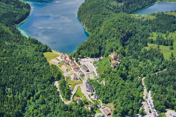Aerial view of Hohenschwangau and Lake Alpsee in Bavaria, Germany.