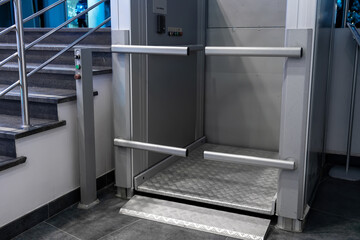 Elevator for wheel chair indoor. Disabled persons lift in modern apartment facility. Special...