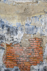 Grunge old red brick and plaster wall texture