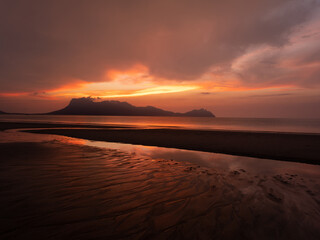 Orange atmosphere with a sunset on the beach of Bako in Borneo, Malaysia.