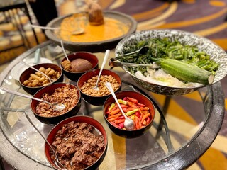 
Serving of traditional Javanese food, namely vegetable pecel in the breakfast menu at a luxury hotel.