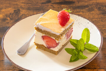slice of strawberry cake on a plate