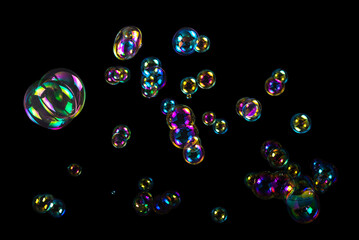 Soap bubbles isolated on a black background.