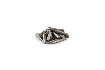Fototapeta premium Isolated on a white background tips of a group of phillips head screwdriver bits. Top view.