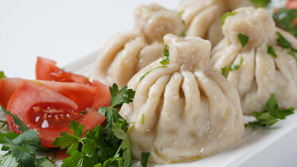 Georgian dumplings Khinkali with meat and red pepper, Traditional National Georgian cuisine.