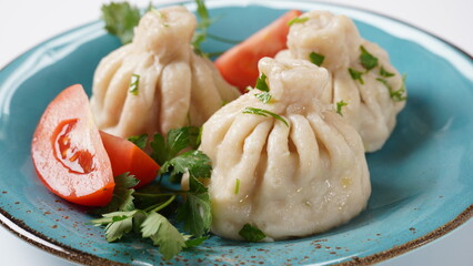 Georgian dumplings Khinkali with meat and red pepper, Traditional National Georgian cuisine.