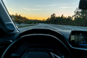 Driving in Portugal, afternoon view from inside a car to scenic panoramic view of driver POV of the road landscape.