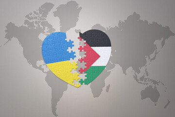 puzzle heart with the national flag of ukraine and jordan on a world map background. Concept.