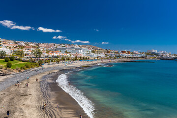 Fototapeta na wymiar El Duque beach and coastline in Tenerife. Adeje coast Canary island, Spain