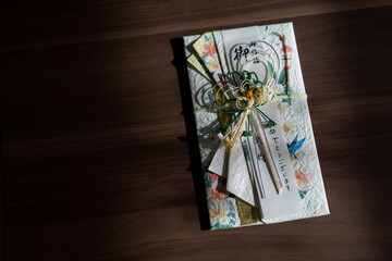 Japanese gift-money envelopes (Noshi-bukuro). Envelope for menetary gift. Japanese word translation “Happy marriage”.