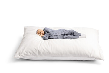 Elderly man in pajamas sleeping on a big pillow