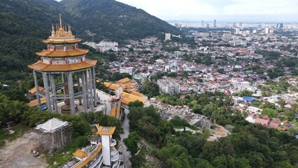 Georgetown, Penang Malaysia - May 17, 2022: The Kek Lok Si Temple. A hilltop temple characterized by colorful, intricate decor and many Buddha statues.