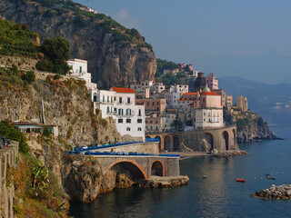 The typical pretty town Atrani with blue sea and sky on the famous Amalfi coast in So