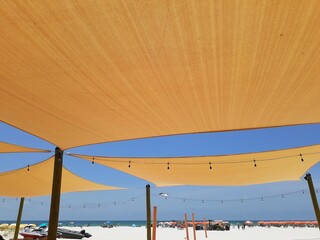 beach tent covering at the seashore - 505775071