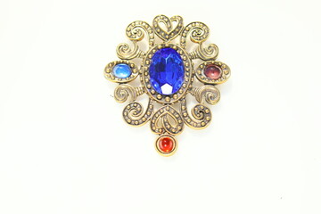 Large scrolls antiqued gold tone brooch with blue stone brooch pin costume jewelry accessory