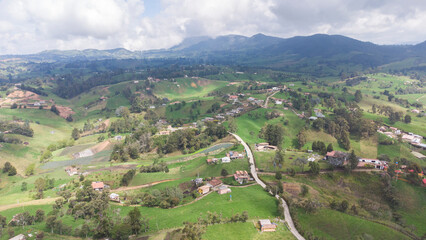 Naklejka na ściany i meble Panoramic natural landscape municipality of San Pedrto de los Milagros, Antioquia Colombia, views from the air, drone photography