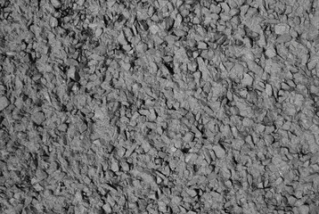 gray background. in the photo, gray decorative plaster on the wall.
