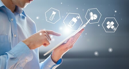Doctor working on mobile smart phone with pharmacy icons. Online medical concept