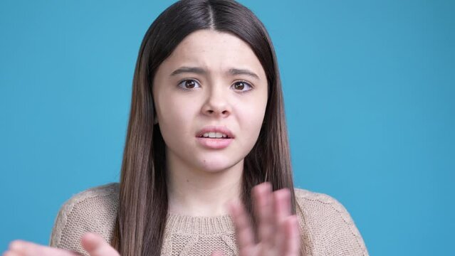 Teen lady portrait frighten horrible news avoid isolated blue color background
