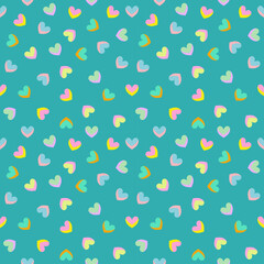 Seamless pastel heart shape. Multi-colored hearts arranged on colorful background, fabric pattern concept, wrapping paper, book cover, baby clothes, wallpaper, tablecloth.