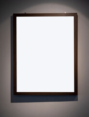 wooden frame with white screen and grey wall