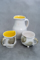 Fototapeta na wymiar Ceramics, a ceramic product made with hands, made on a potter's wheel, a jug, a mug, clay.