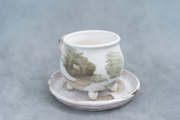     Ceramics, a ceramic product made with hands, made on a potter's wheel, a jug, a mug, clay.