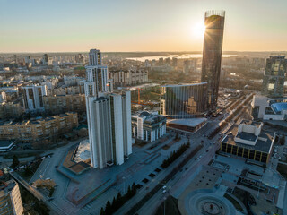 Yekaterinburg aerial panoramic view in spring at sunset. Yekaterinburg city and pond in spring or autumn.