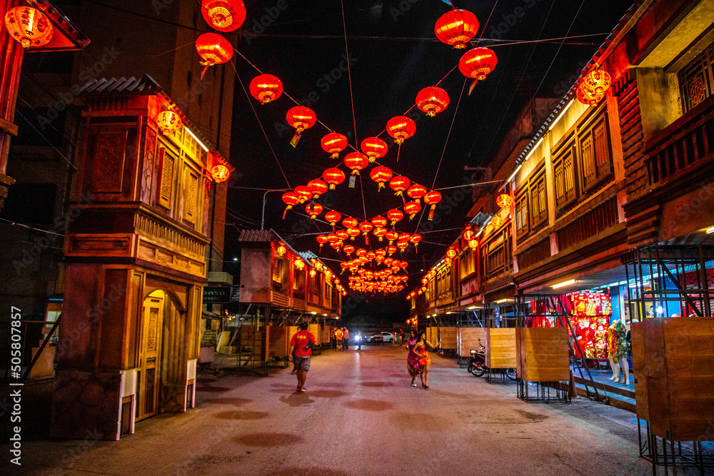 Wall mural lantern festival in nakhon sawan night market in thailand