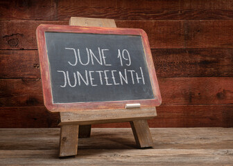 Juneteenth (June 19), white chalk writing on a blackboard in retro classroom – also known as Freedom Day, Jubilee Day, Liberation Day, and Emancipation Day - obrazy, fototapety, plakaty