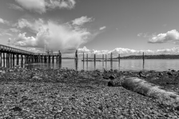 A view from a rocky beach on the shore of Puget Sound in Tacoma, Washington.