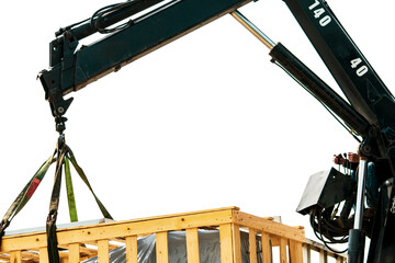 Worker working with mobile crane isolated on white background. Crane delivery machine in wooden box...