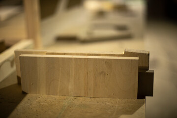 Boards on table. Furniture details. Blanks made of wood.