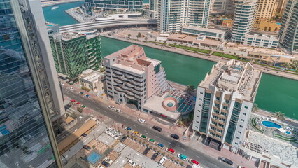 Dubai Marina skyscrapers and JBR district with luxury buildings and resorts aerial timelapse