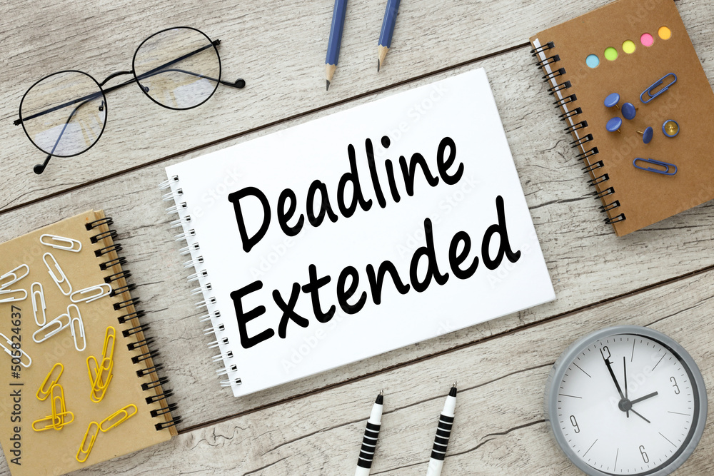 Poster deadline extended open notepad with text. near glasses and notebooks