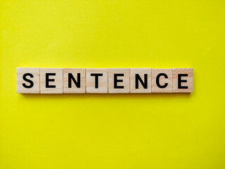 The concept of the word Sentence yellow background.